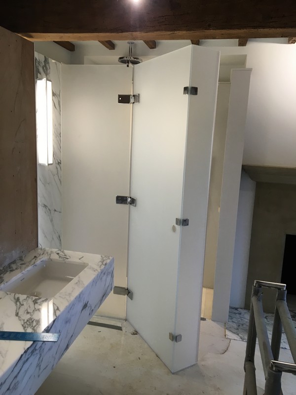 Bespoke frosted glass shower enclosure in Luton luxury bathroom