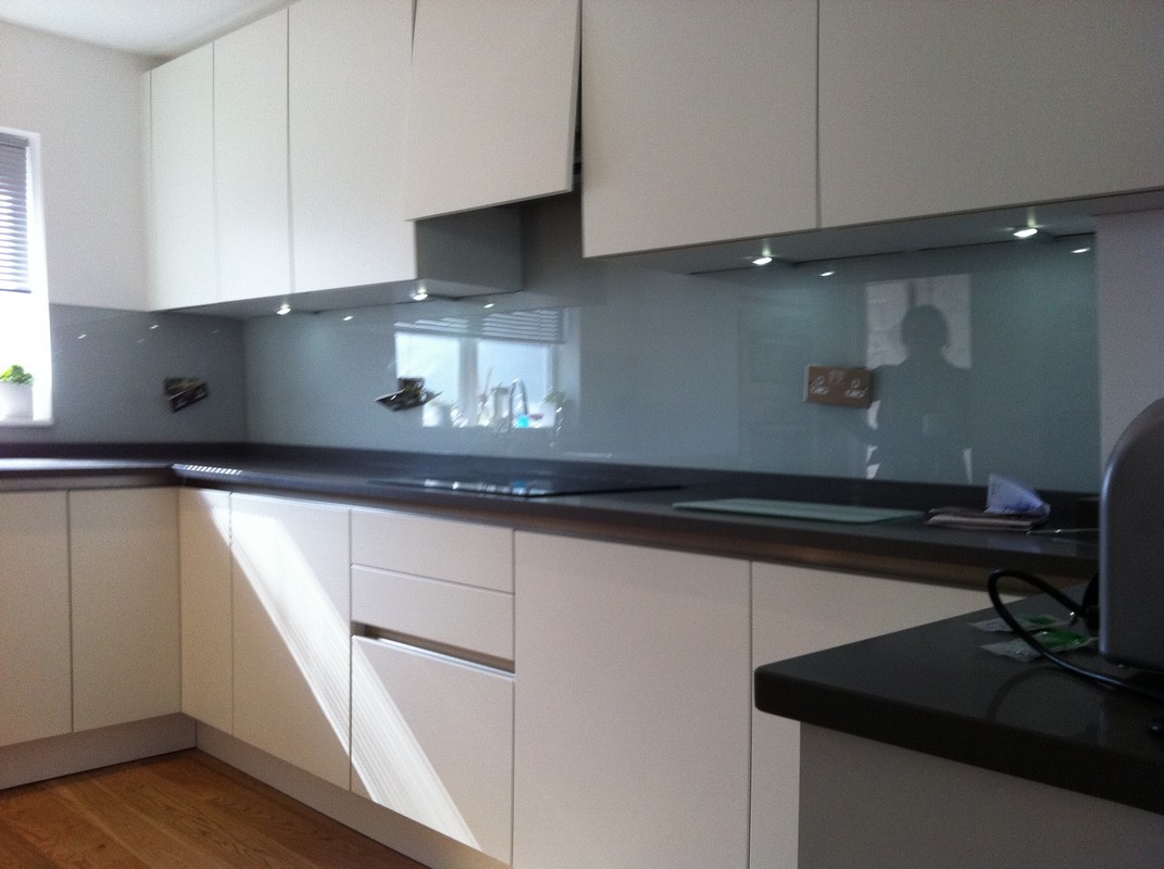 Grey glass kitchen splashback with LED lighting in Luton
