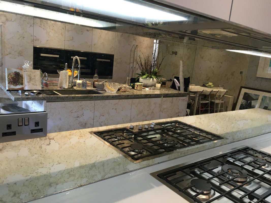 Mirror glass splashback in Luton luxury kitchen
